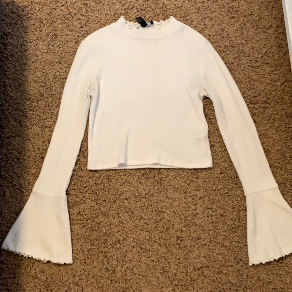 White cropped turtleneck sweater